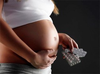 беременная с таблетками